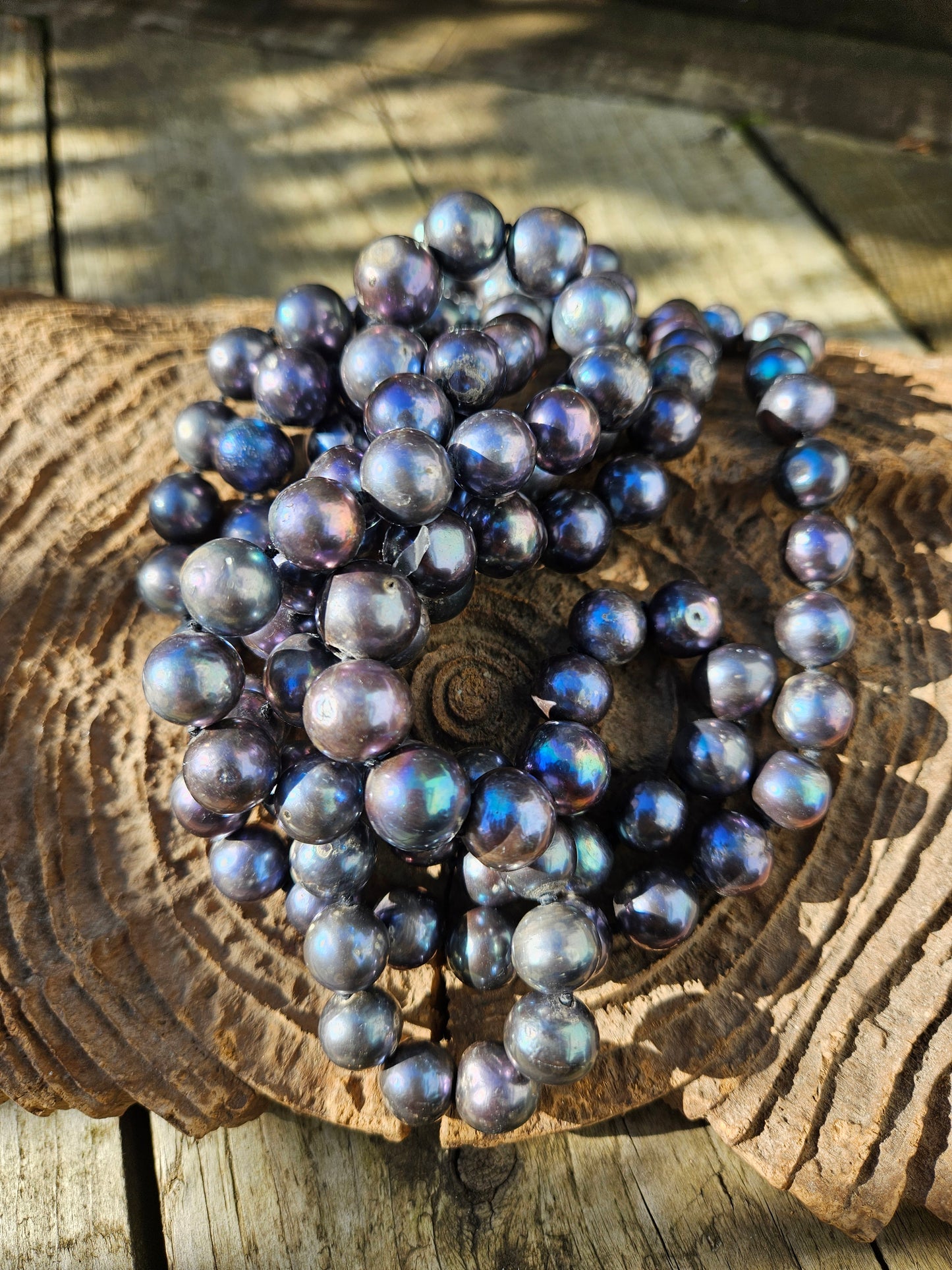 Long Strand of Blue/Black Pearls