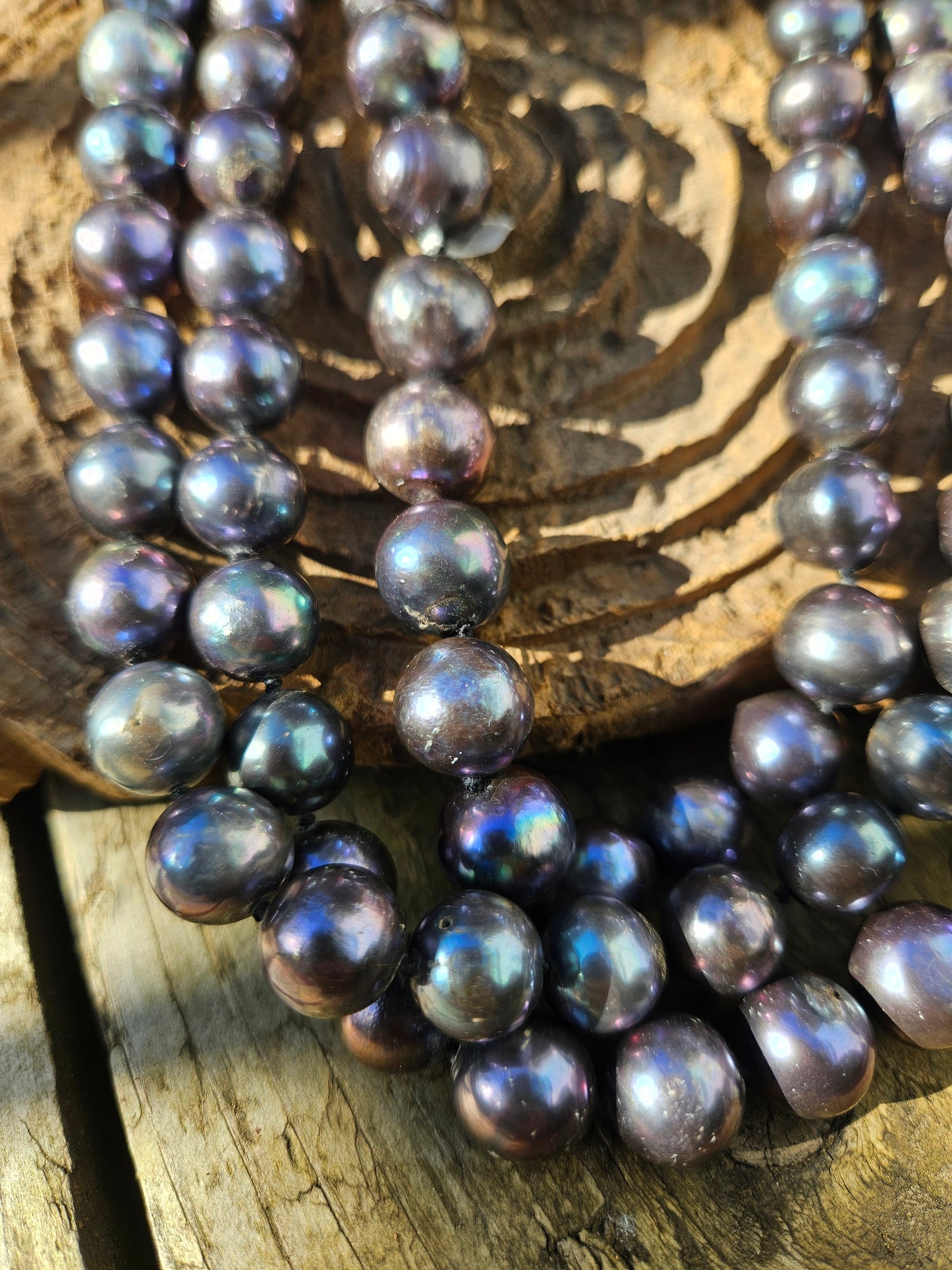 Long Strand of Blue/Black Pearls