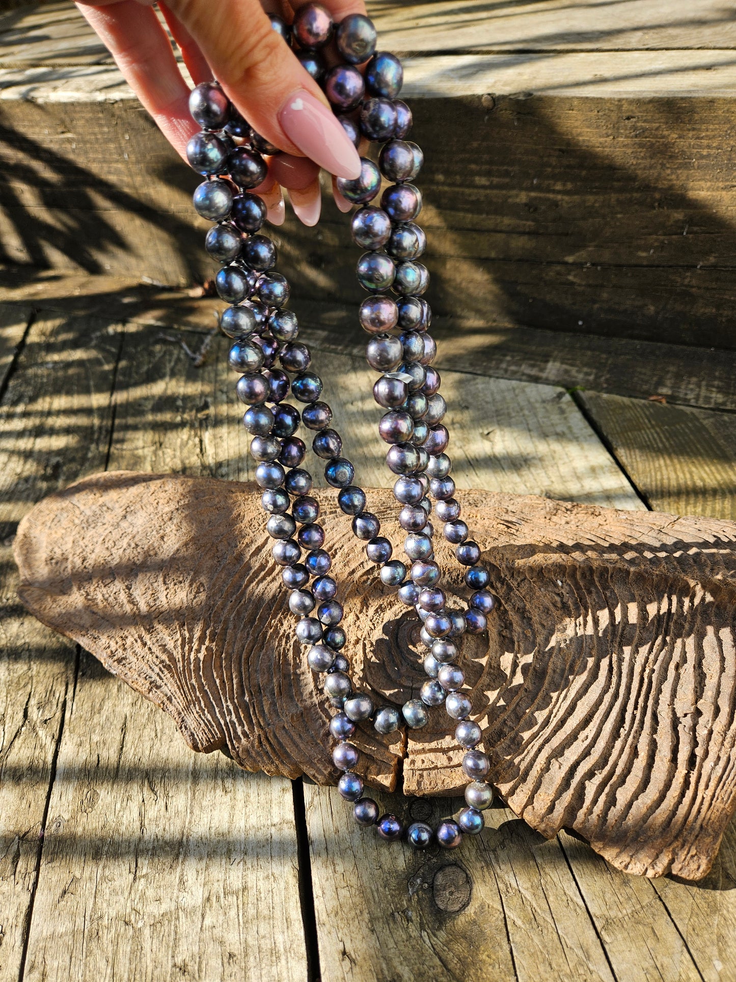 Long Strand of Blue/Black Pearls