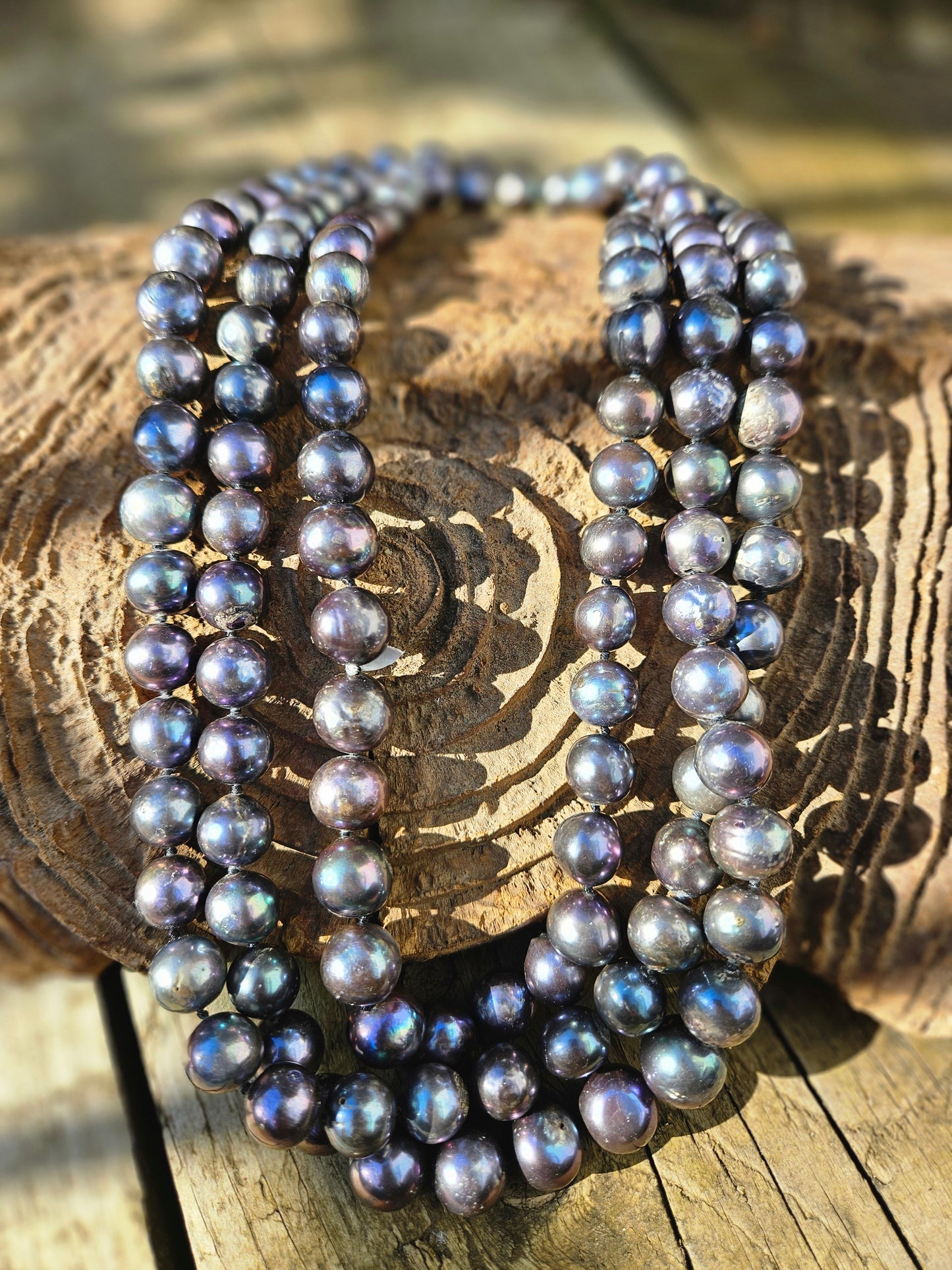 Long Strand of Blue/Black Pearls