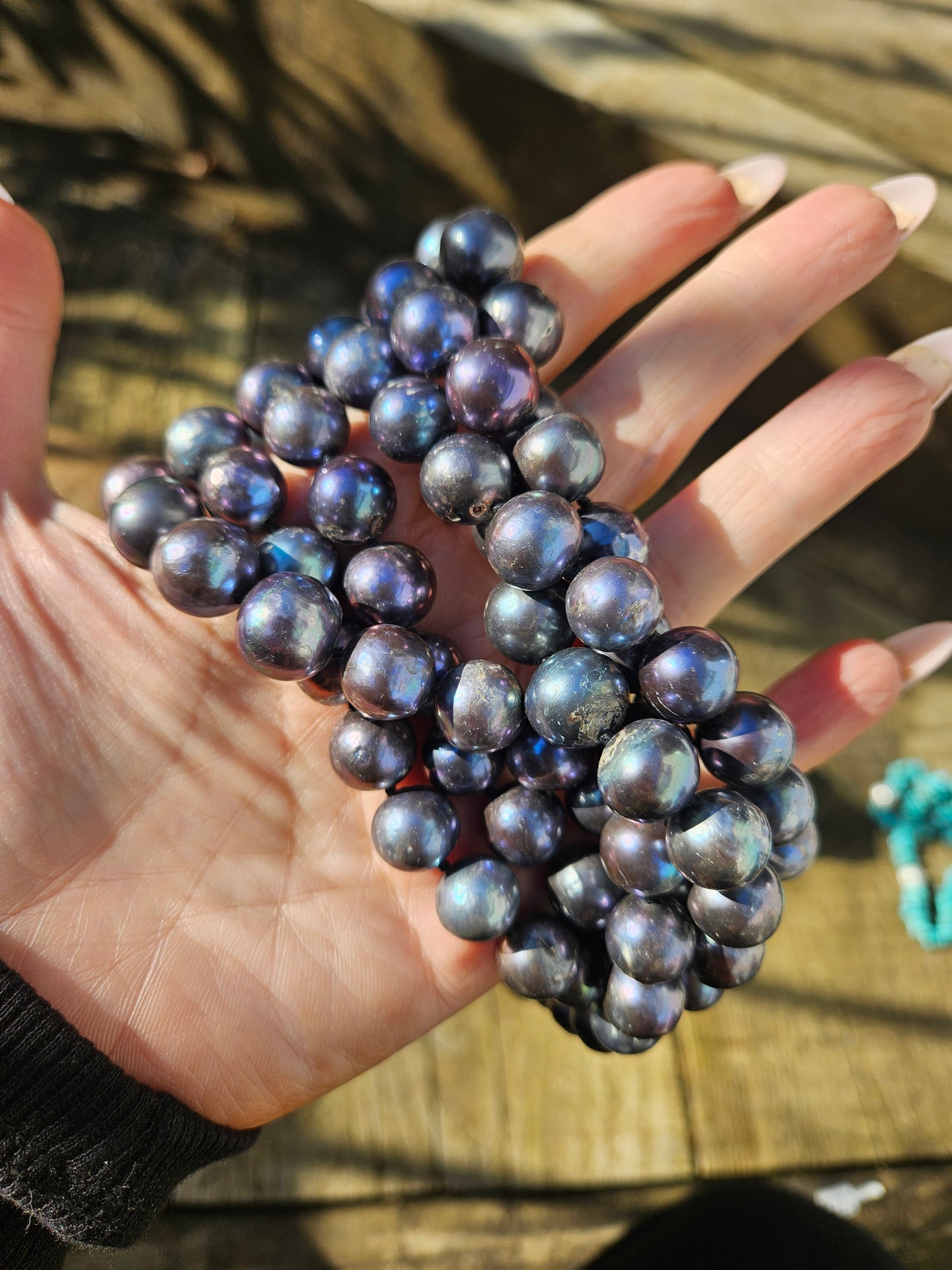 Long Strand of Blue/Black Pearls